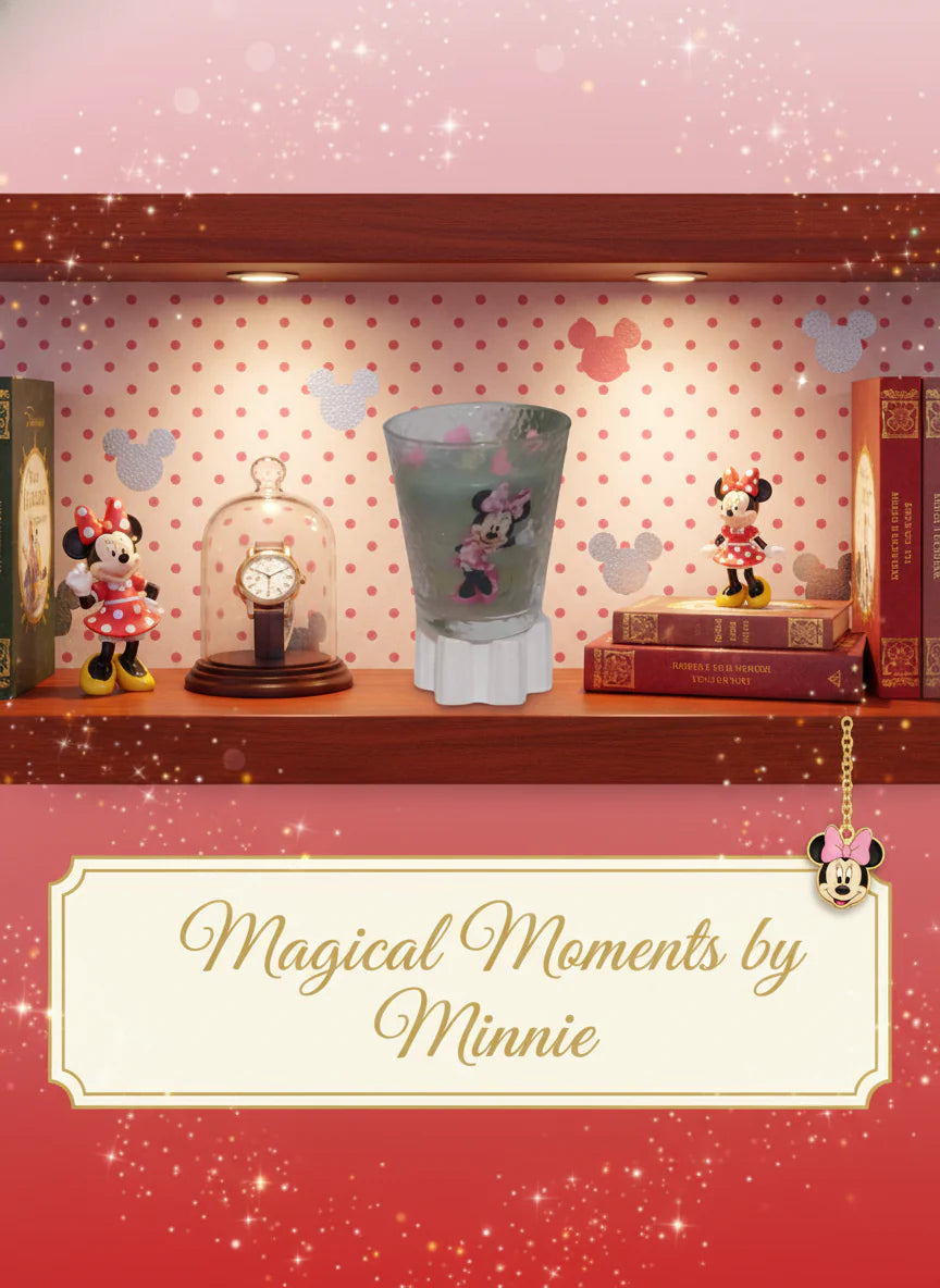 Magical Moments by Minnie with decorative items on a shelf against a polka dot wall.